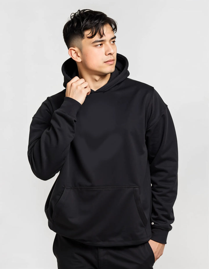 Empulse DNA Oversized Hoodie in black worn by male model front view