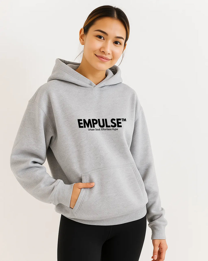 Close-up side angle of man in Empulse™ ash grey hoodie, showing logo and neckline
