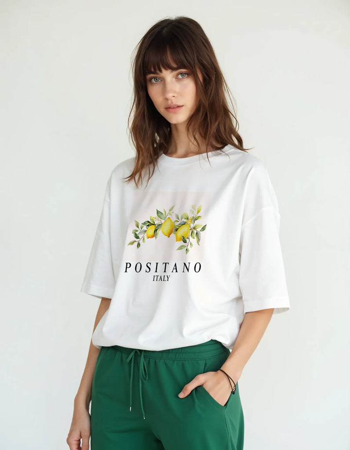 Empulse™ Positano Sorona t-shirt in white with lemon print, worn by female model front-facing