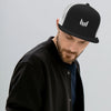 Empulse Trucker Cap in black and white, front view