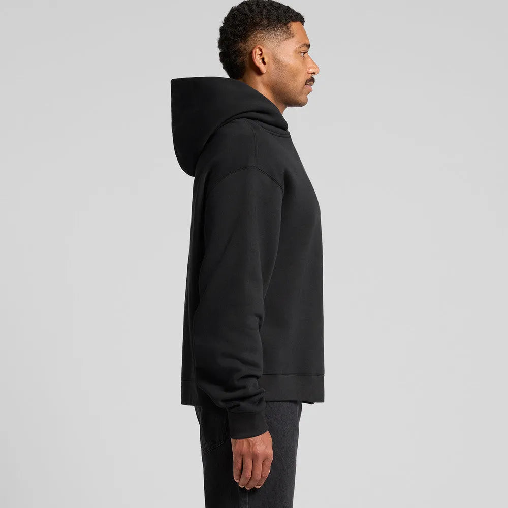  Side profile of model in black oversized boxy hoodie 2