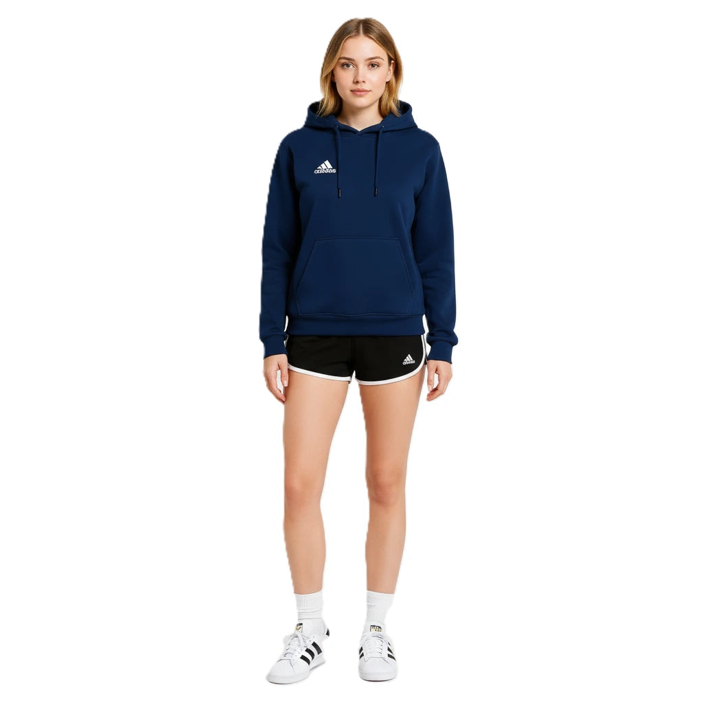 Person wearing a navy blue Adidas hoodie and black shorts on a white background