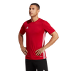Man wearing a red Adidas sports jersey on a white background