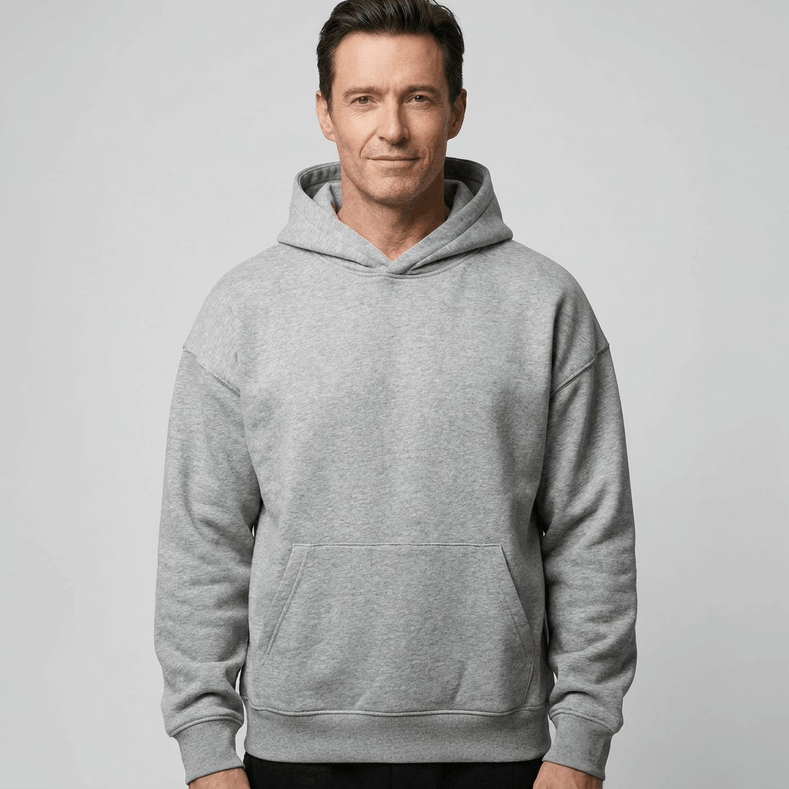 Custom Made Hoodie 5151 in Grey Marle, on-model, front view, 500 GSM 100% cotton French terry, Empulse custom branding