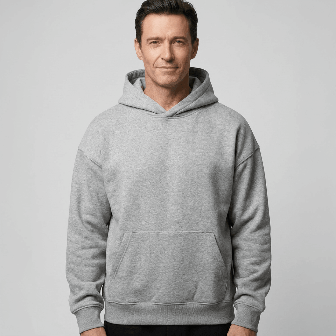 Custom Made Hoodie 5151 in Grey Marle, on-model, front view, 500 GSM 100% cotton French terry, Empulse custom branding