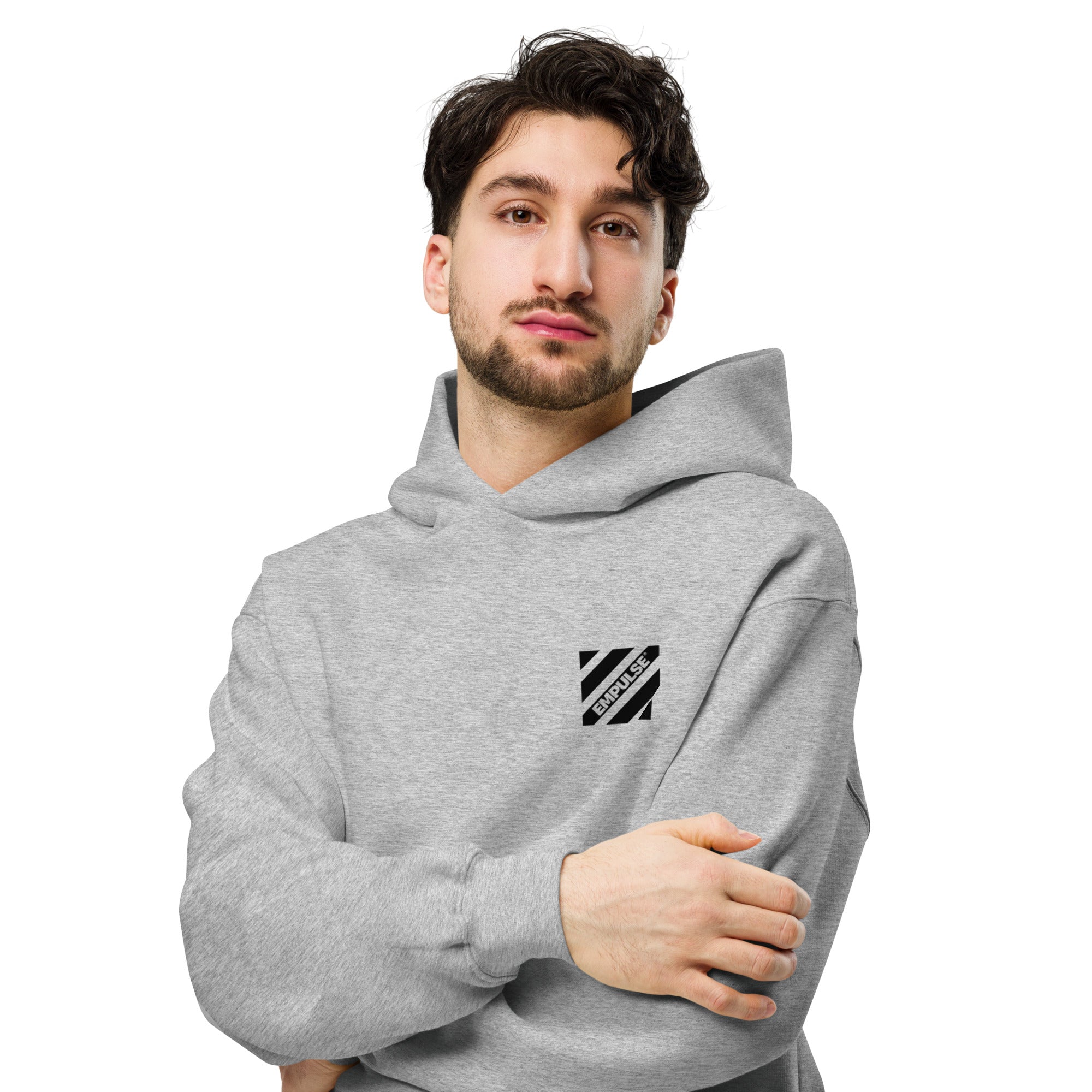 Man wearing oversized hoodie in grey EMPULSE® DNA print