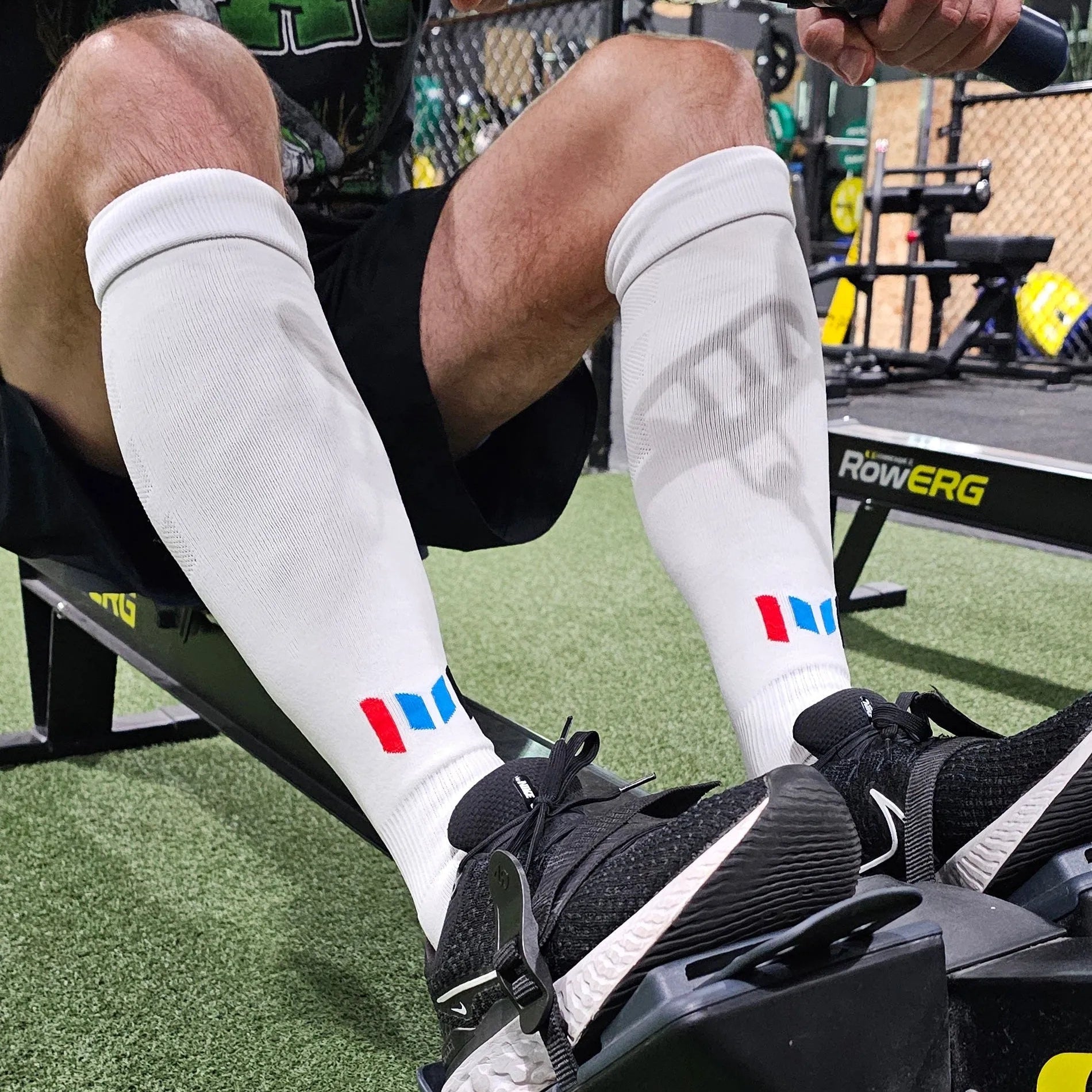 Empulse ACE25 knee-high compression socks, athlete lifestyle view