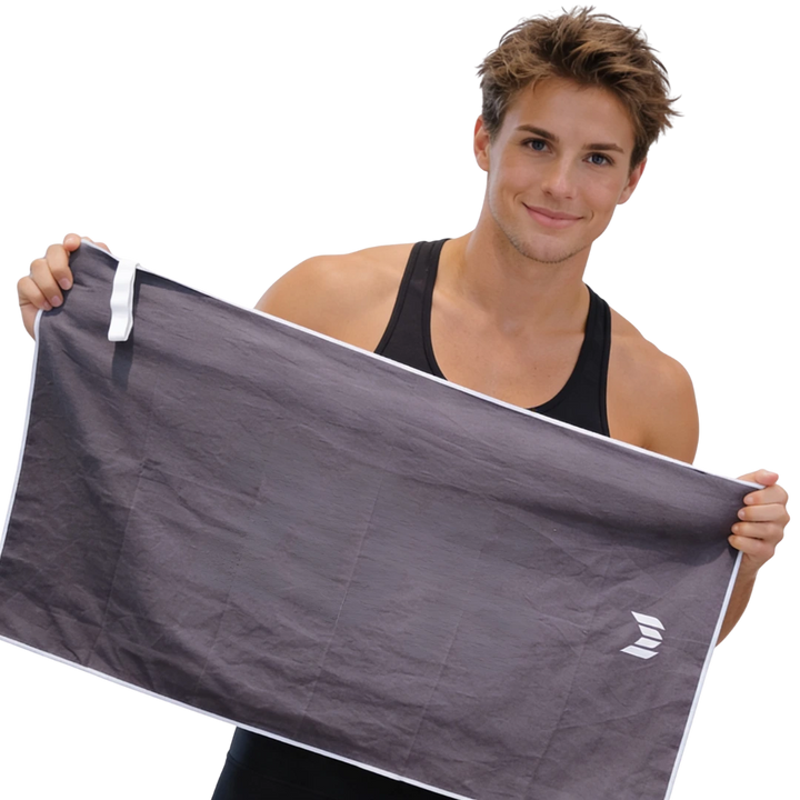 Man holding an Empulse gray towel with a logo on a white background