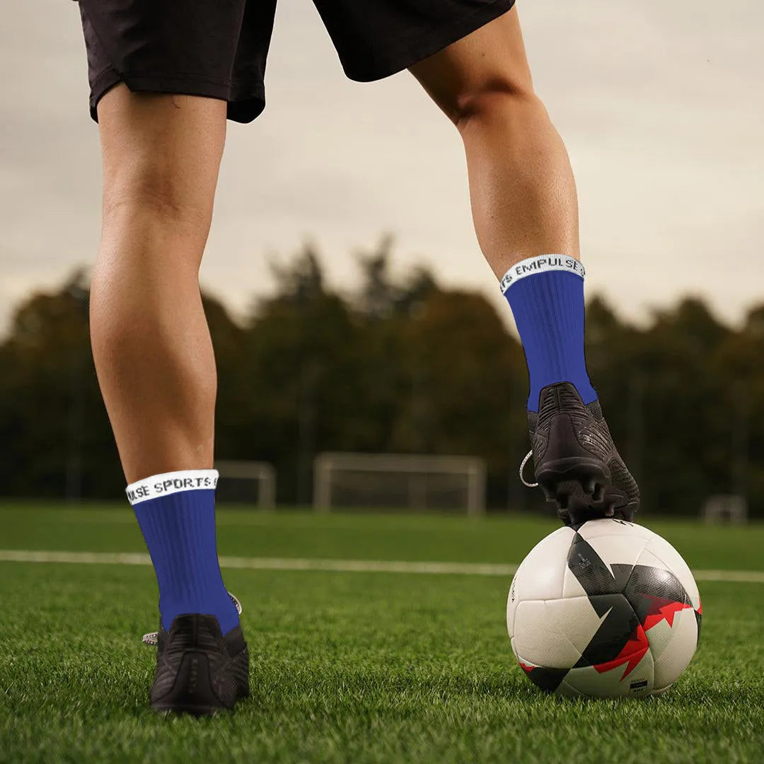 Empulse™ Grip Socks Pro Blue Worn On Pitch