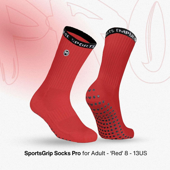 Red socks with black grips and text on a light pink background