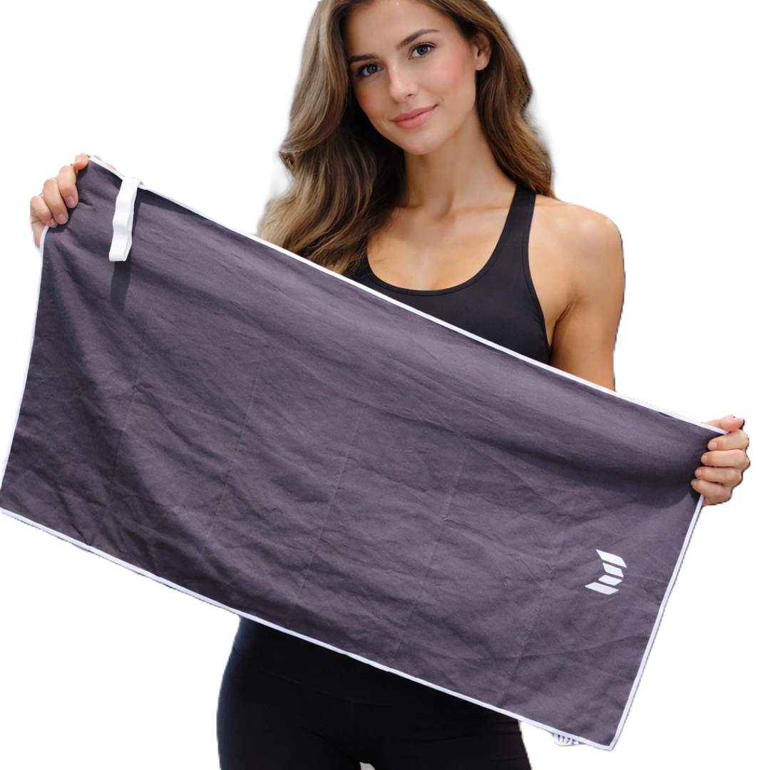 Woman holding a purple towel with a logo on a white background