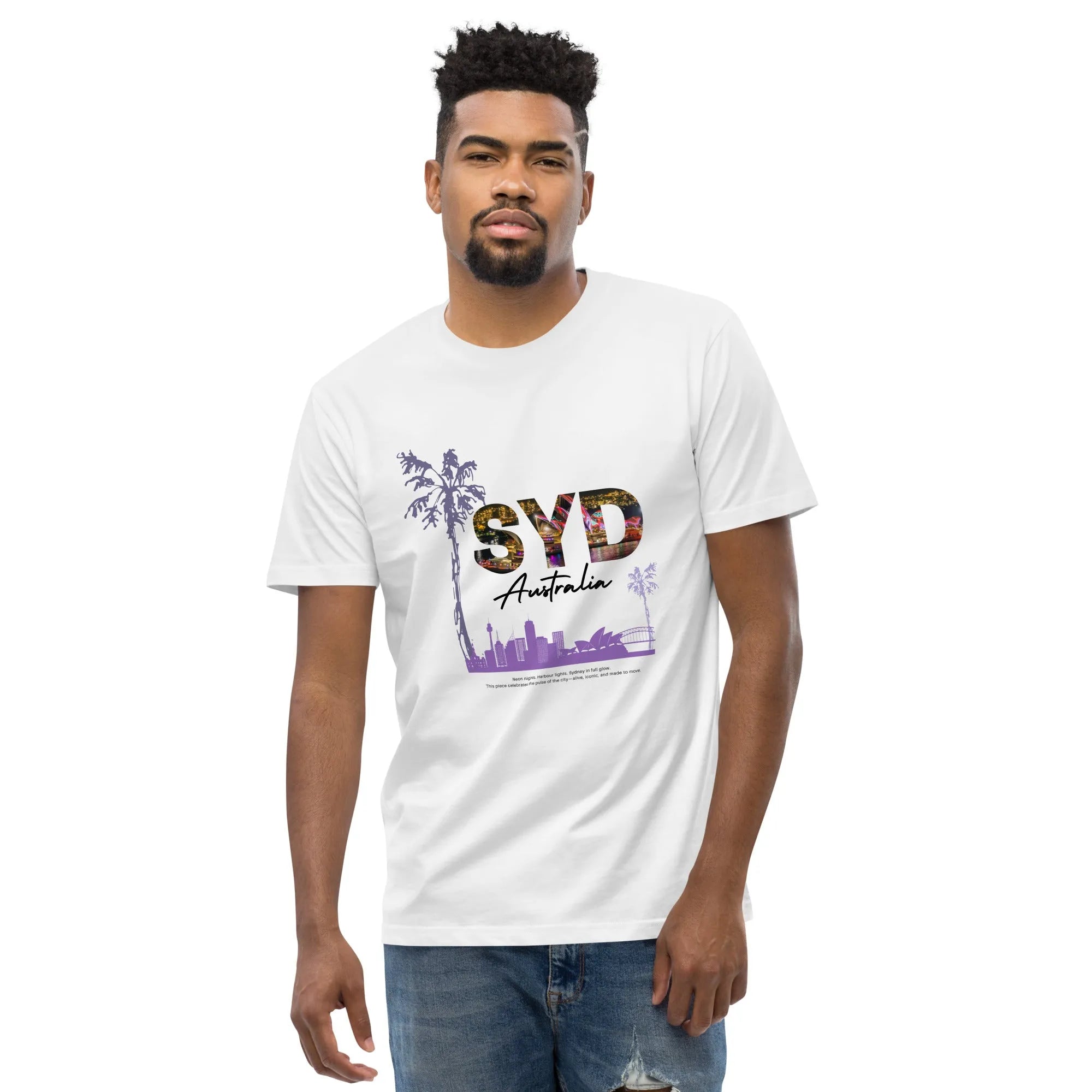 Male model wearing Empulse™ Sydney white tee with bold SYD print and skyline graphic