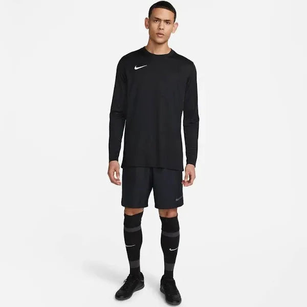 Nike Park VII Long Sleeve Tee – worn by male model with soccer shorts and socks.
