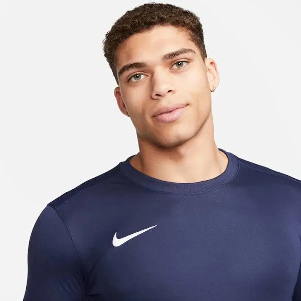 Nike Dri-FIT Park VII navy long sleeve tee worn by male model, close-up of upper chest and neckline.