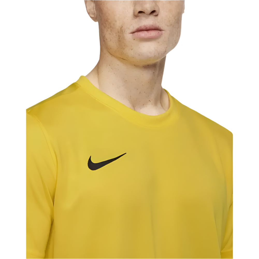 Close-up of chest on Nike Men's Park 7 Jersey in yellow showing black swoosh logo