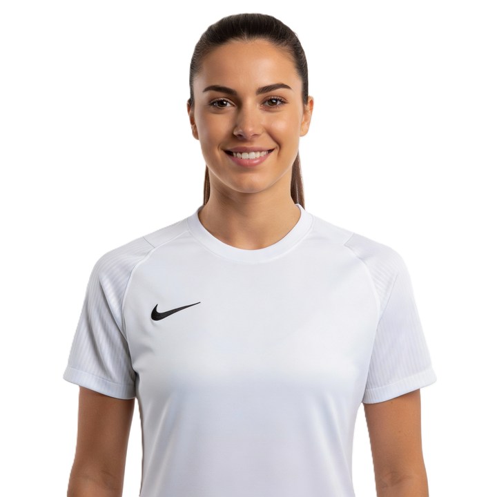 Woman wearing a white Nike sports jersey on a white background