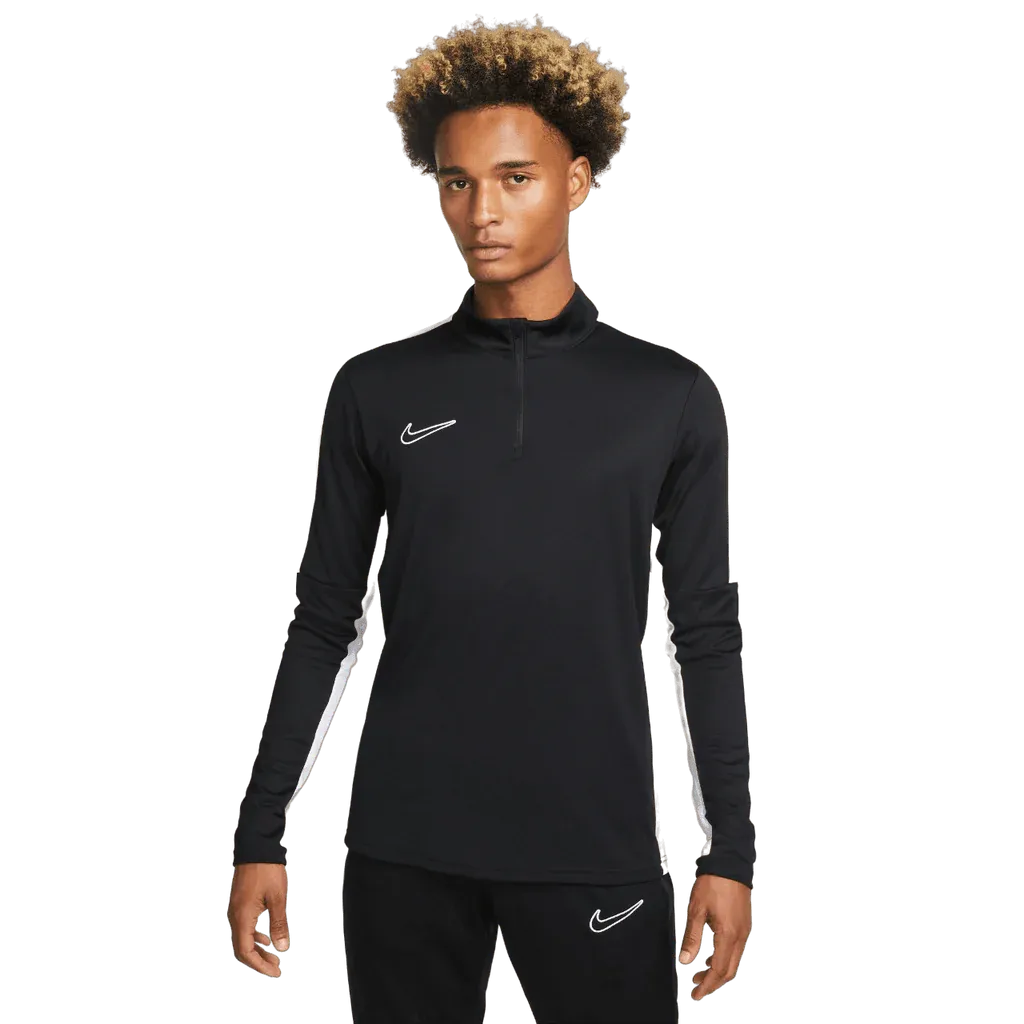 Male model wearing Nike Academy Pro Jacket in black with white Swoosh on chest