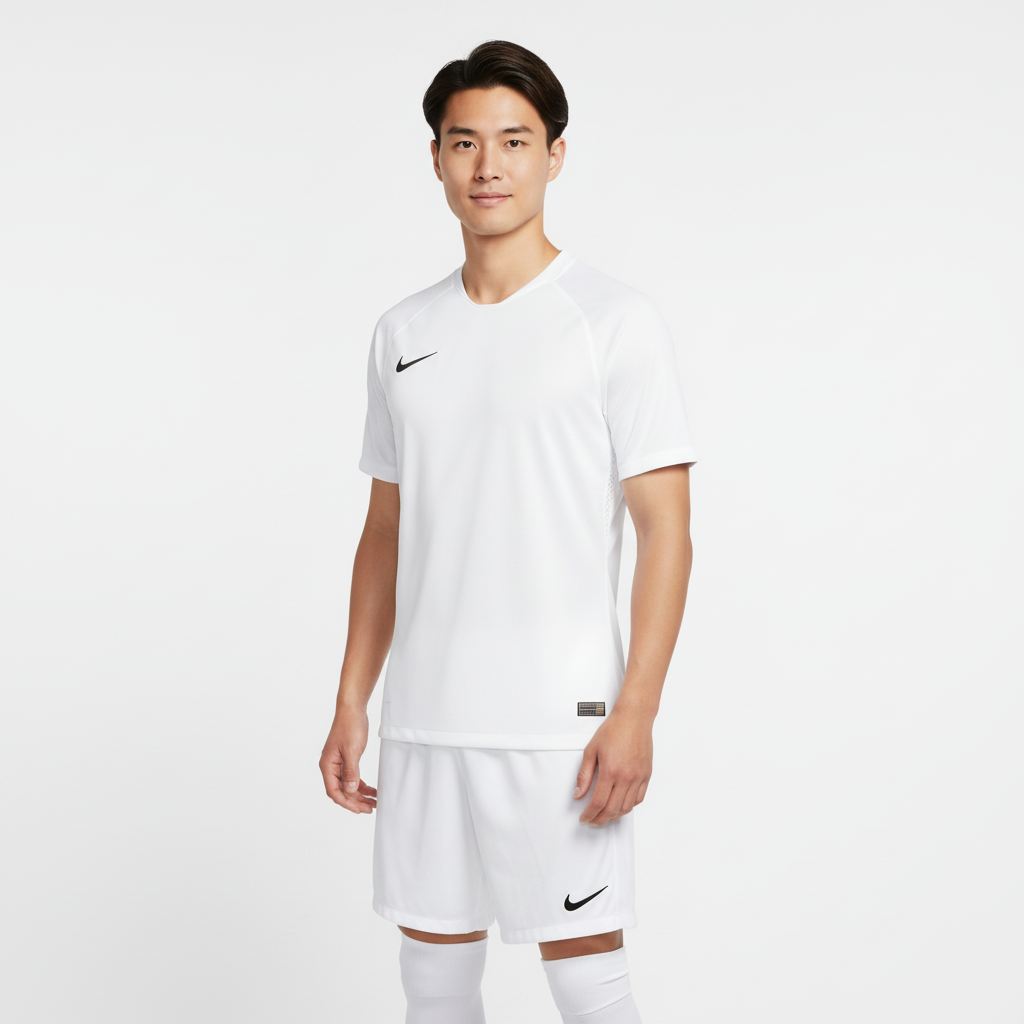 Person wearing a white Nike sports outfit on a light gray background