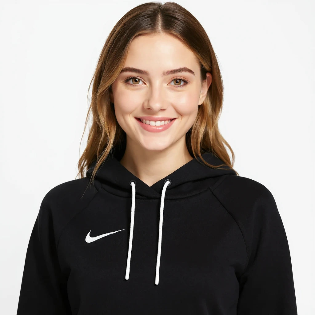 Person wearing a black Nike Park 20 hoodie with a Nike logo on a white background