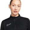 Nike Women's Academy 23 Drill Top black, Swoosh logo close-up on model