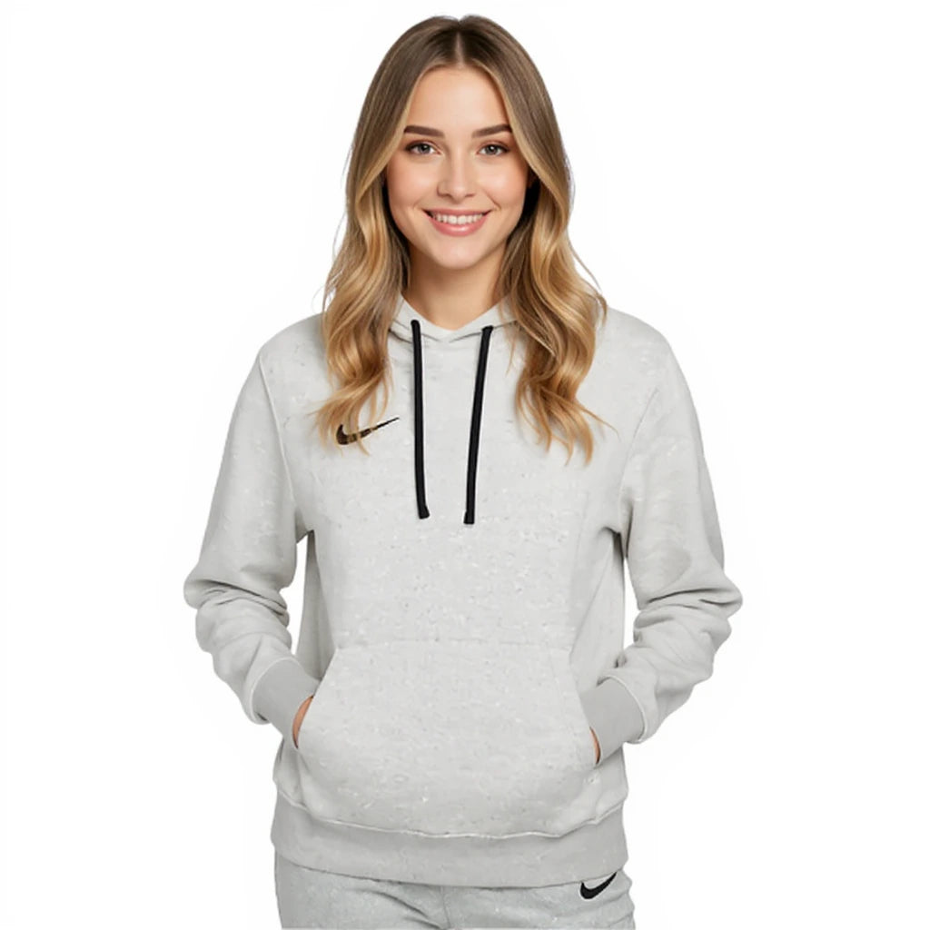 Woman wearing a gray Nike hoodie on a white background