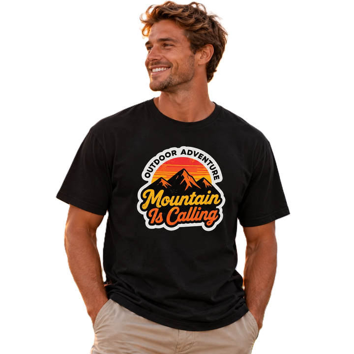 Man wearing black Empulse Outdoors Sorona boxy tee with Mountain Is Calling sunset graphic