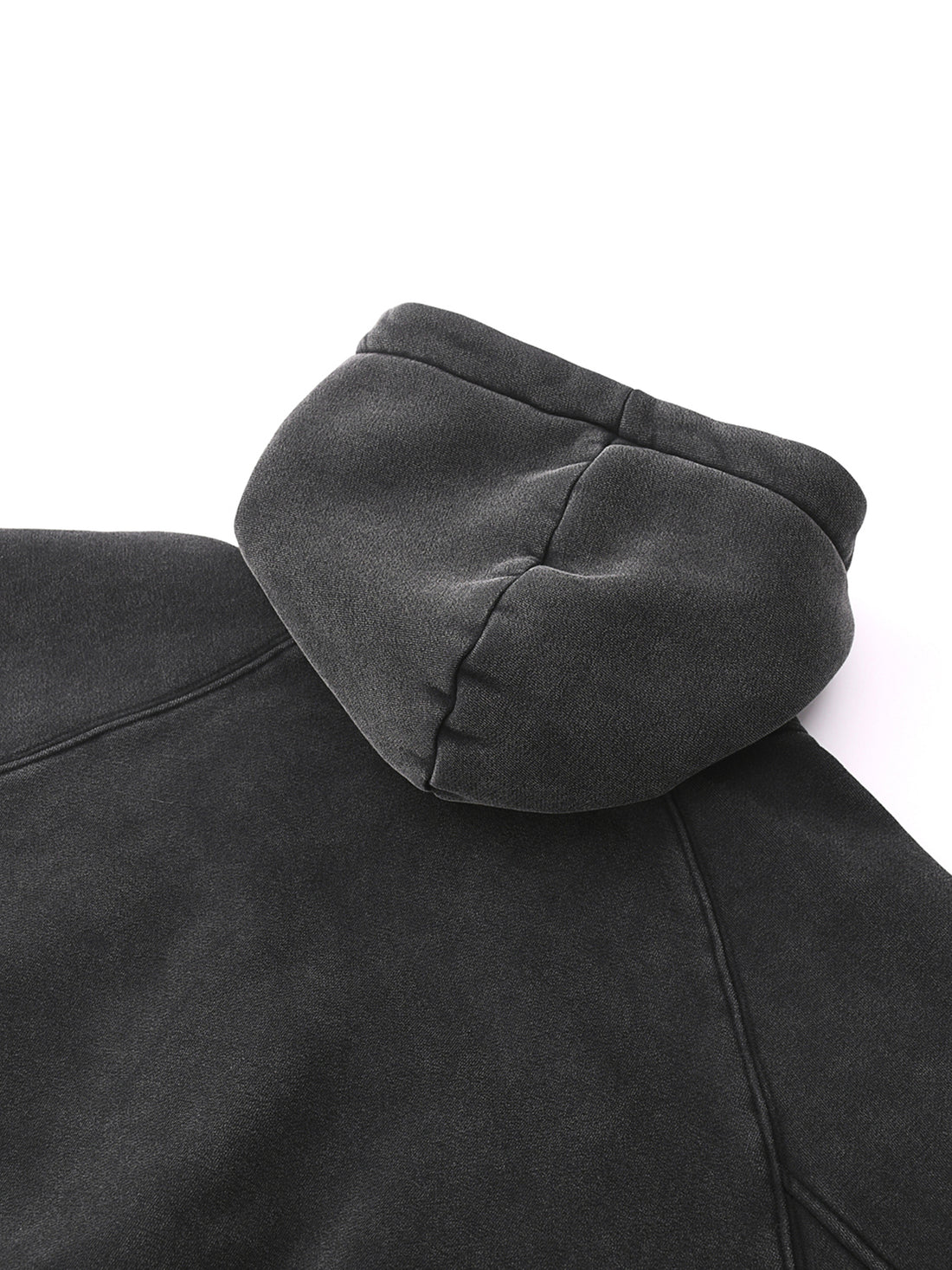 Close-up of a dark gray hoodie with a hood on a white background