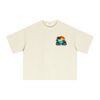 Empulse Coastal Run Club Sorona boxy tee in light apricot, front view with small sunset chest graphic