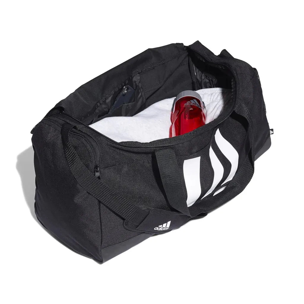 Open view of Adidas Essentials Duffel Bag showing spacious interior and red bottle inside