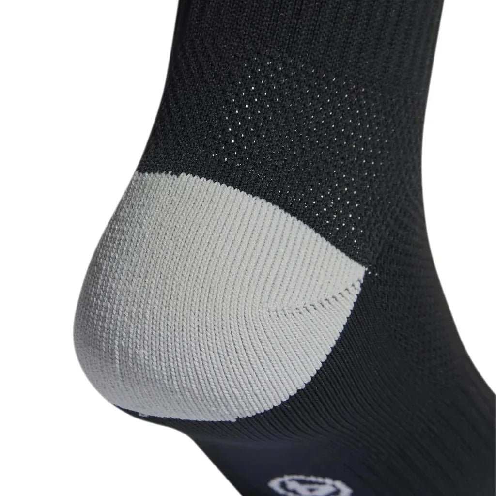 Adidas Milano 23 black sock – heel and arch support detail, Empulse™
