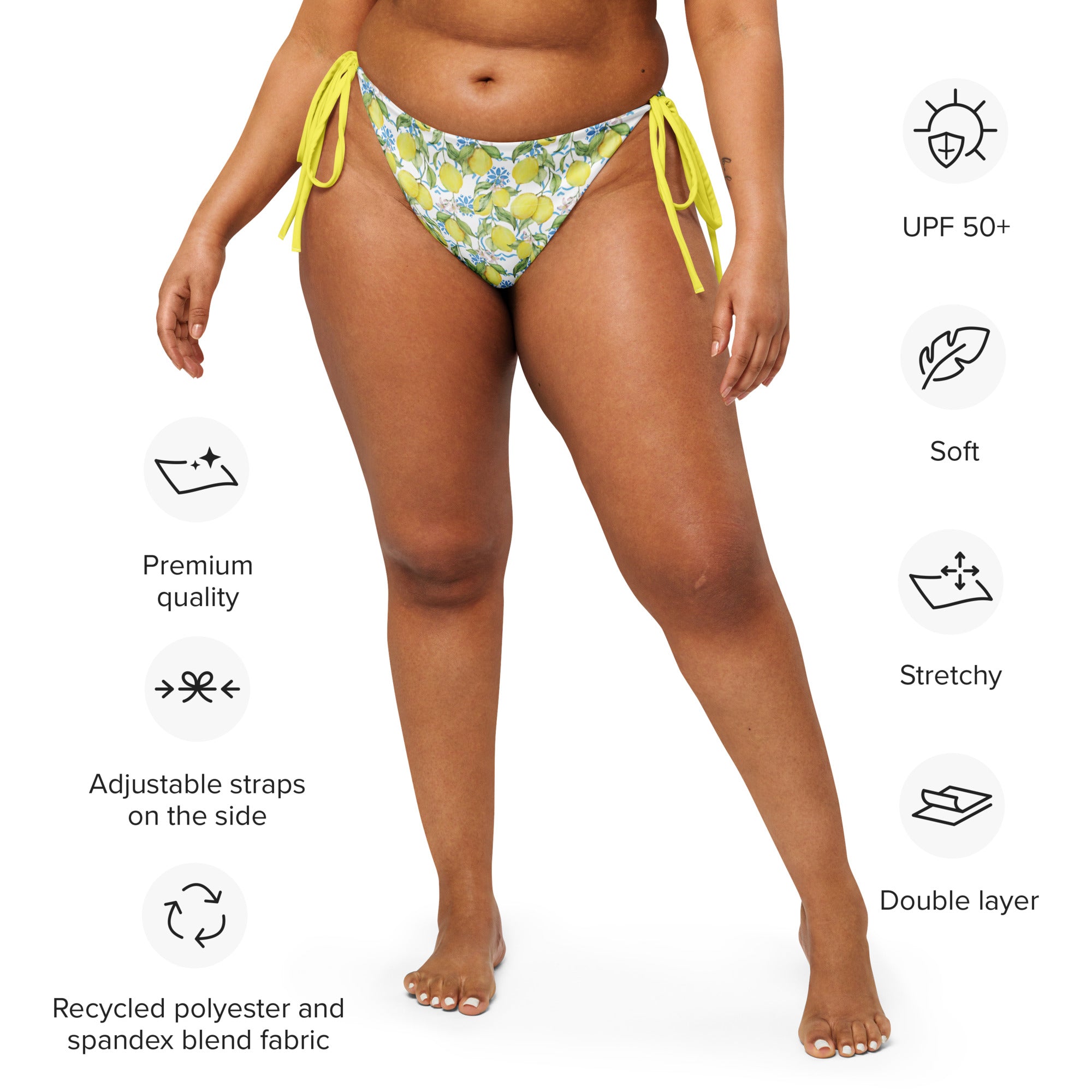 Empulse™ Citrus Pop bikini bottom side pose showing playful fruit print and high-cut tie design