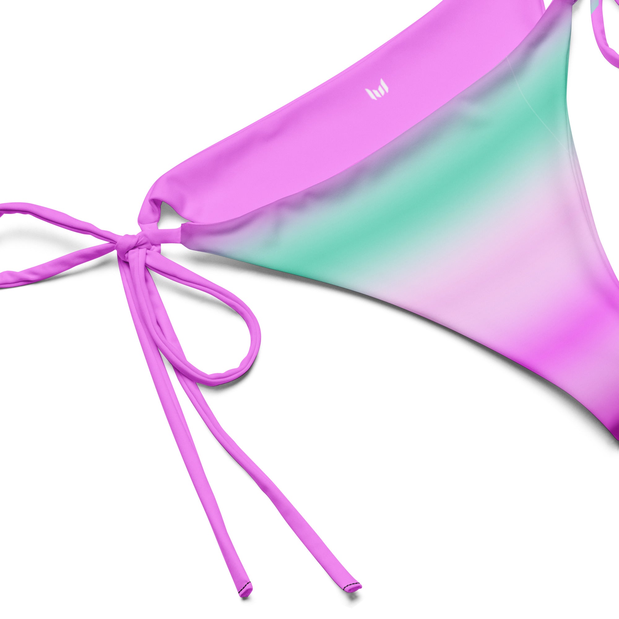 Close-up of side tie and stitching on Empulse cotton candy stripe bikini bottom