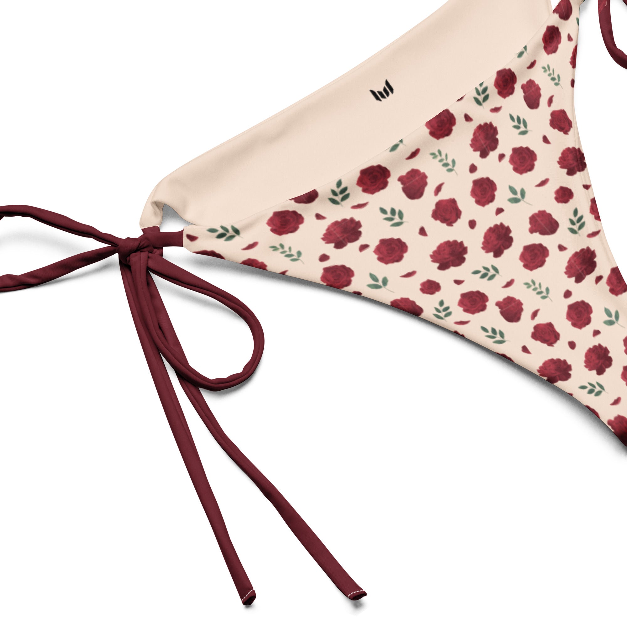 Close-up of Empulse™ Roses Charm bikini bottom left tie detail