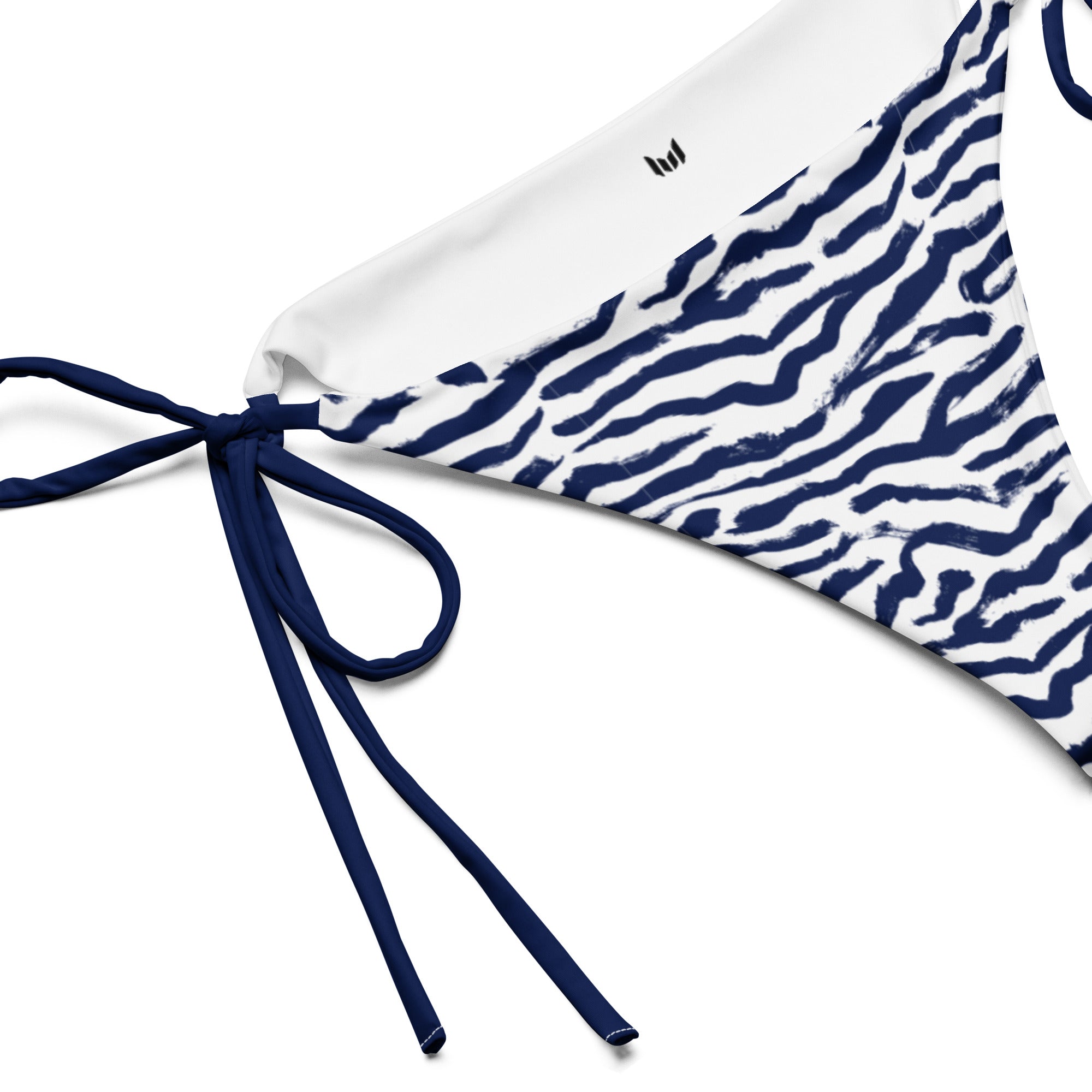 Tie detail close-up of Empulse™ Zebra Midnight Navy bikini bottom