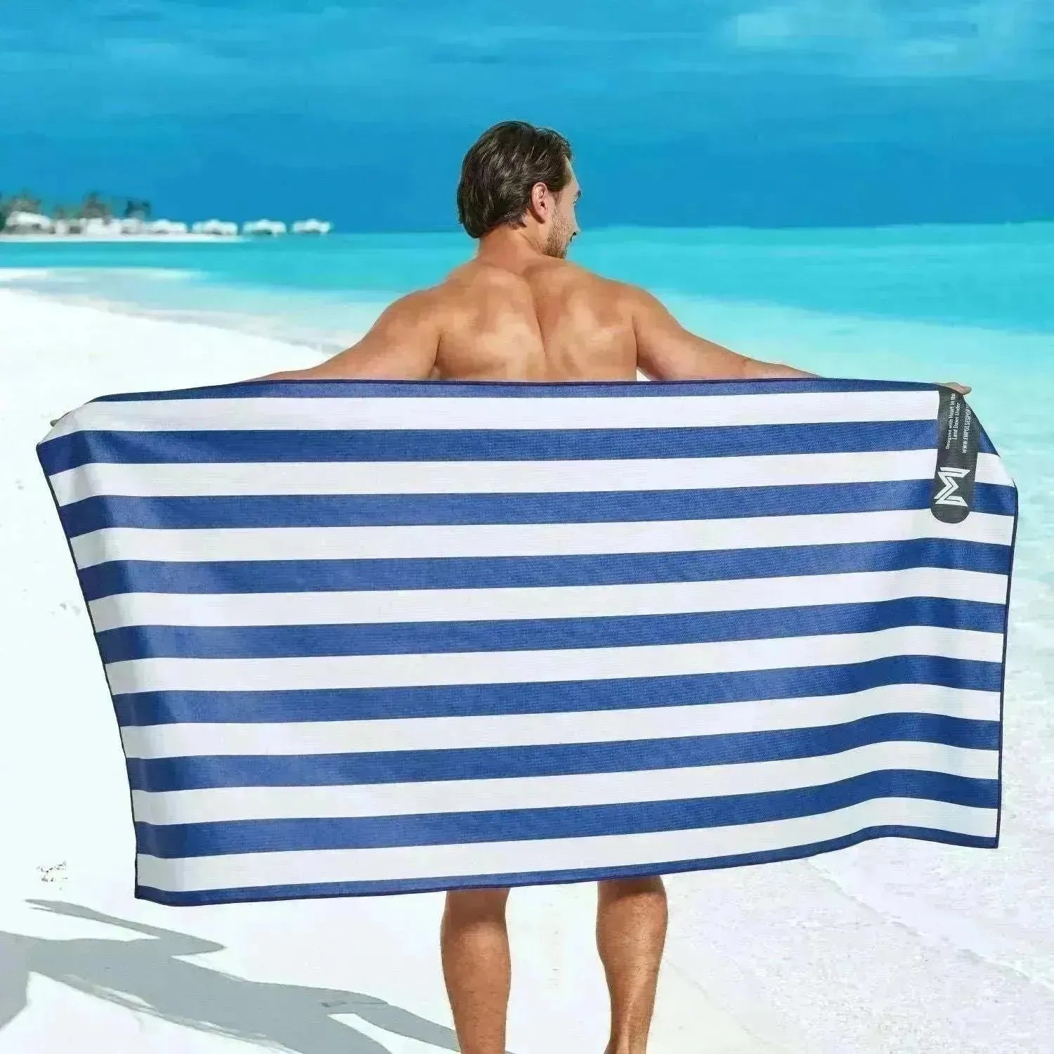 Man standing with Cabana towel fully extended outdoors