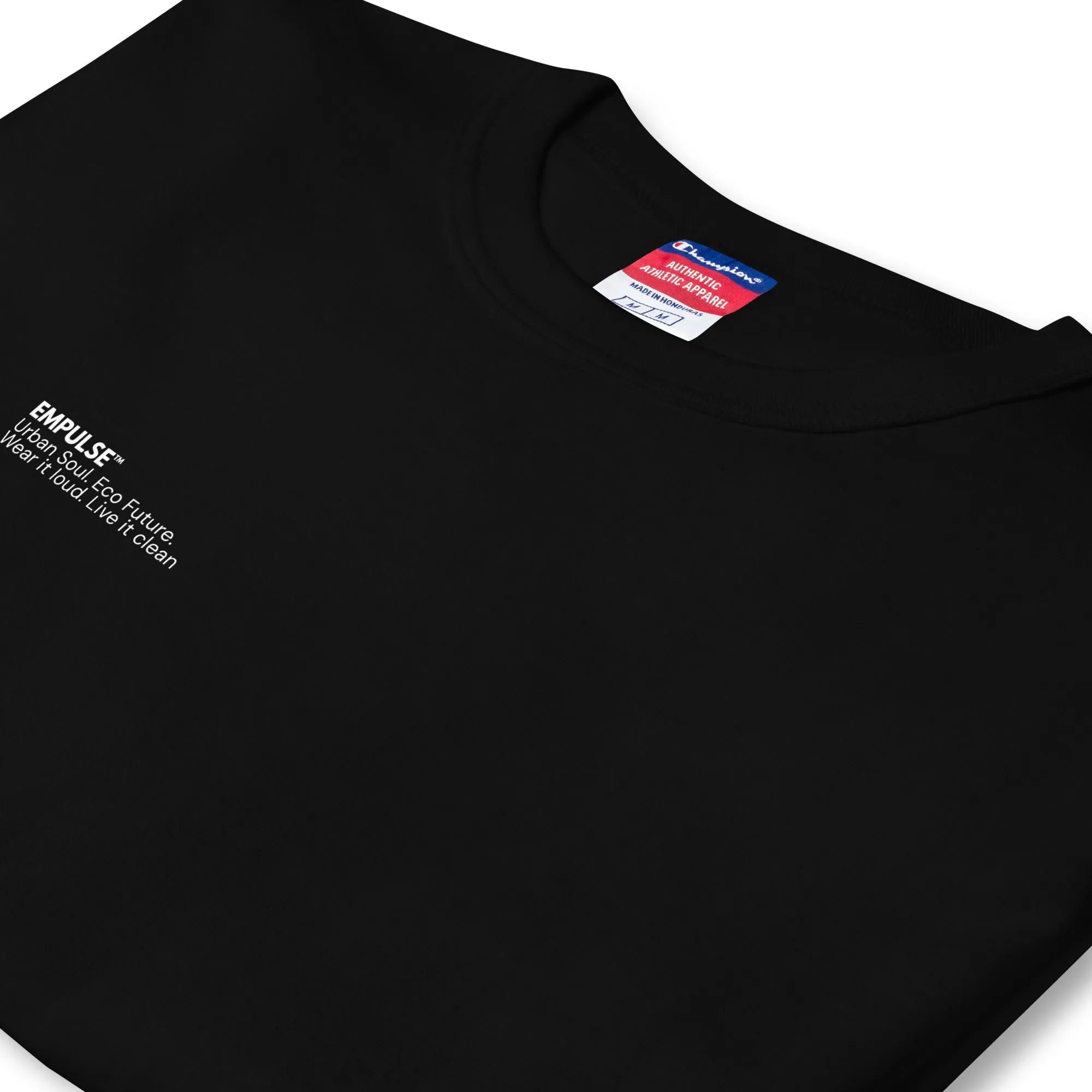  Inside label and tag detail of Champion black t-shirt showing size and branding