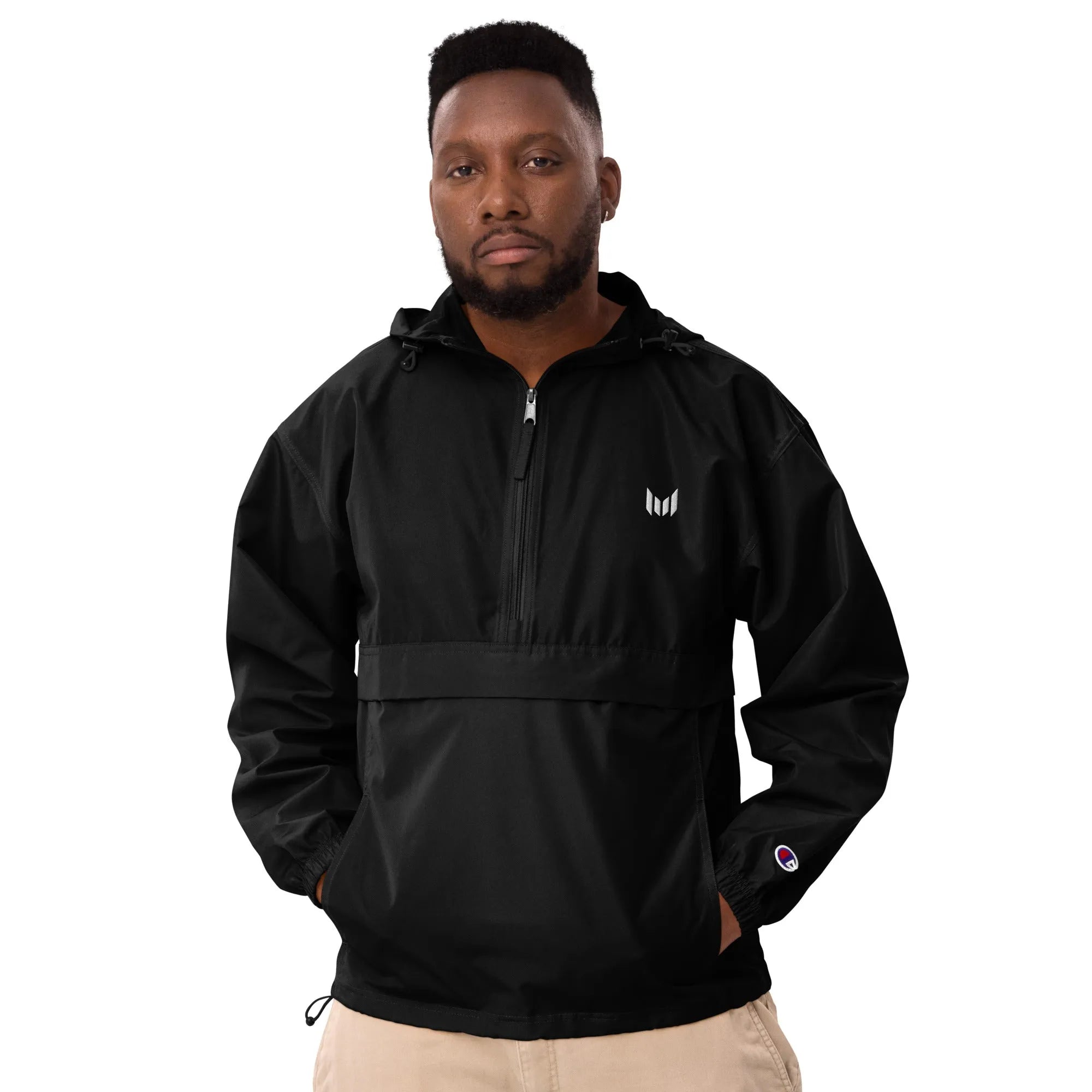 Full view of man in black windbreaker with front zipper pocket