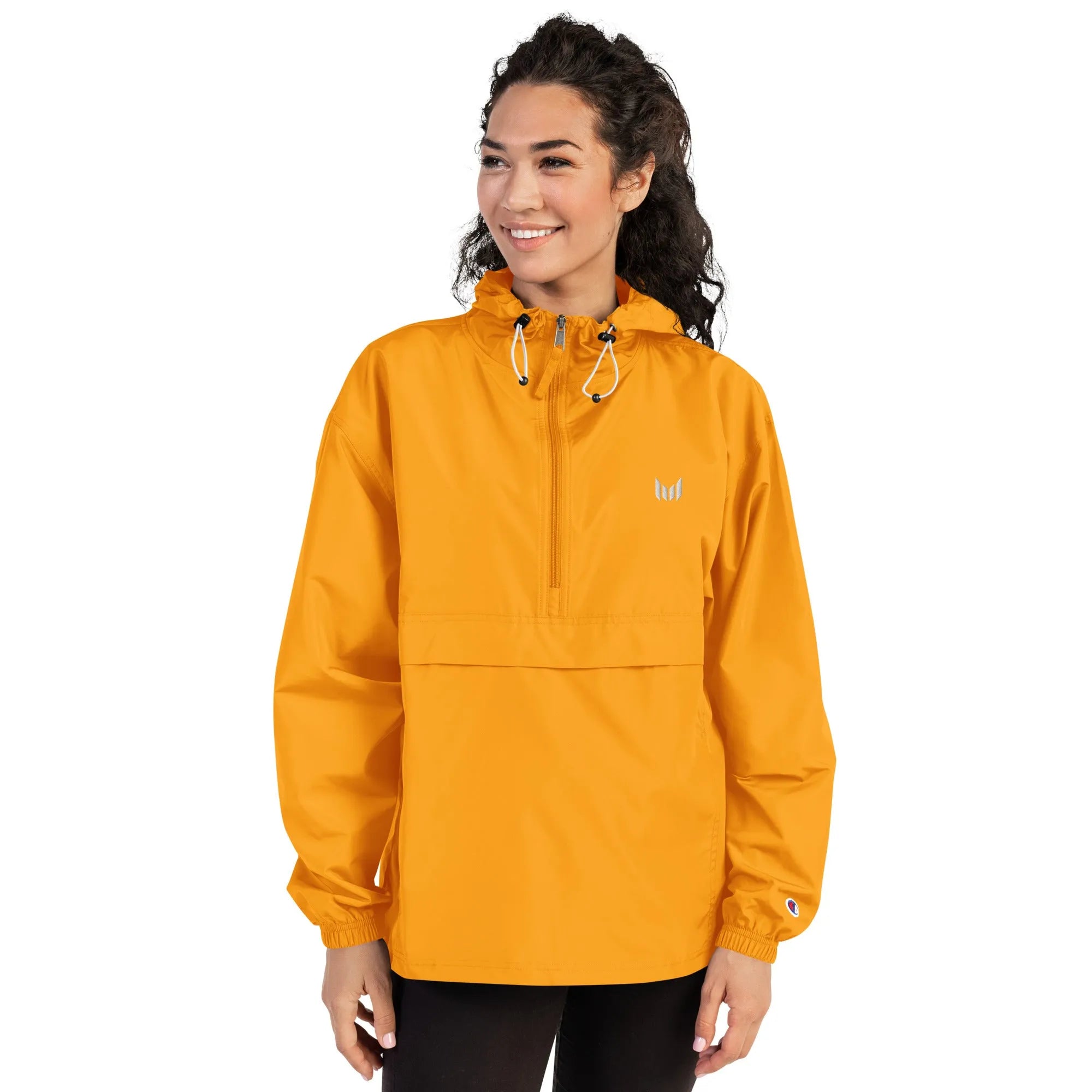 Woman wearing yellow windbreaker with Empulse logo, front-facing