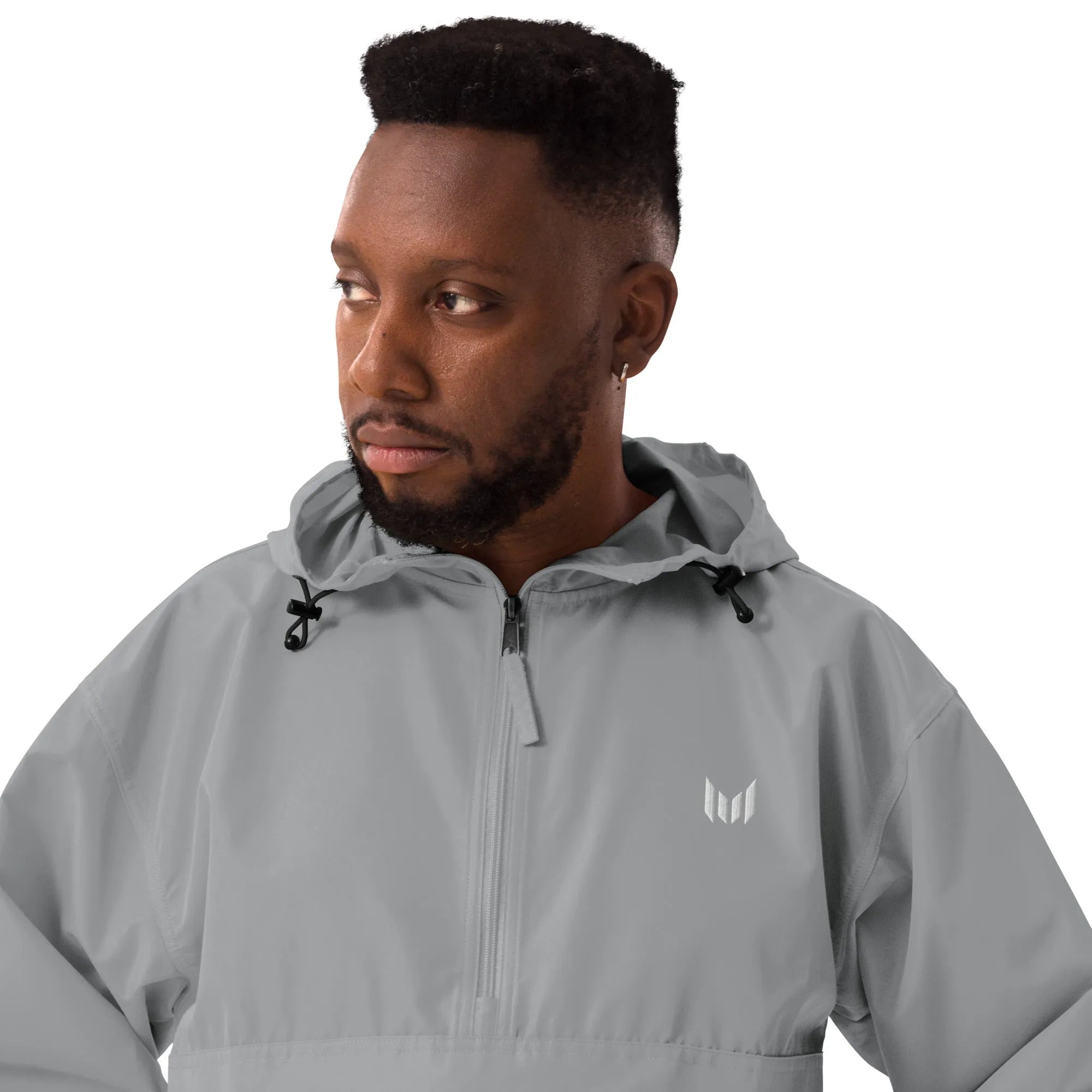 Man in light grey windbreaker, detailed view of drawstrings