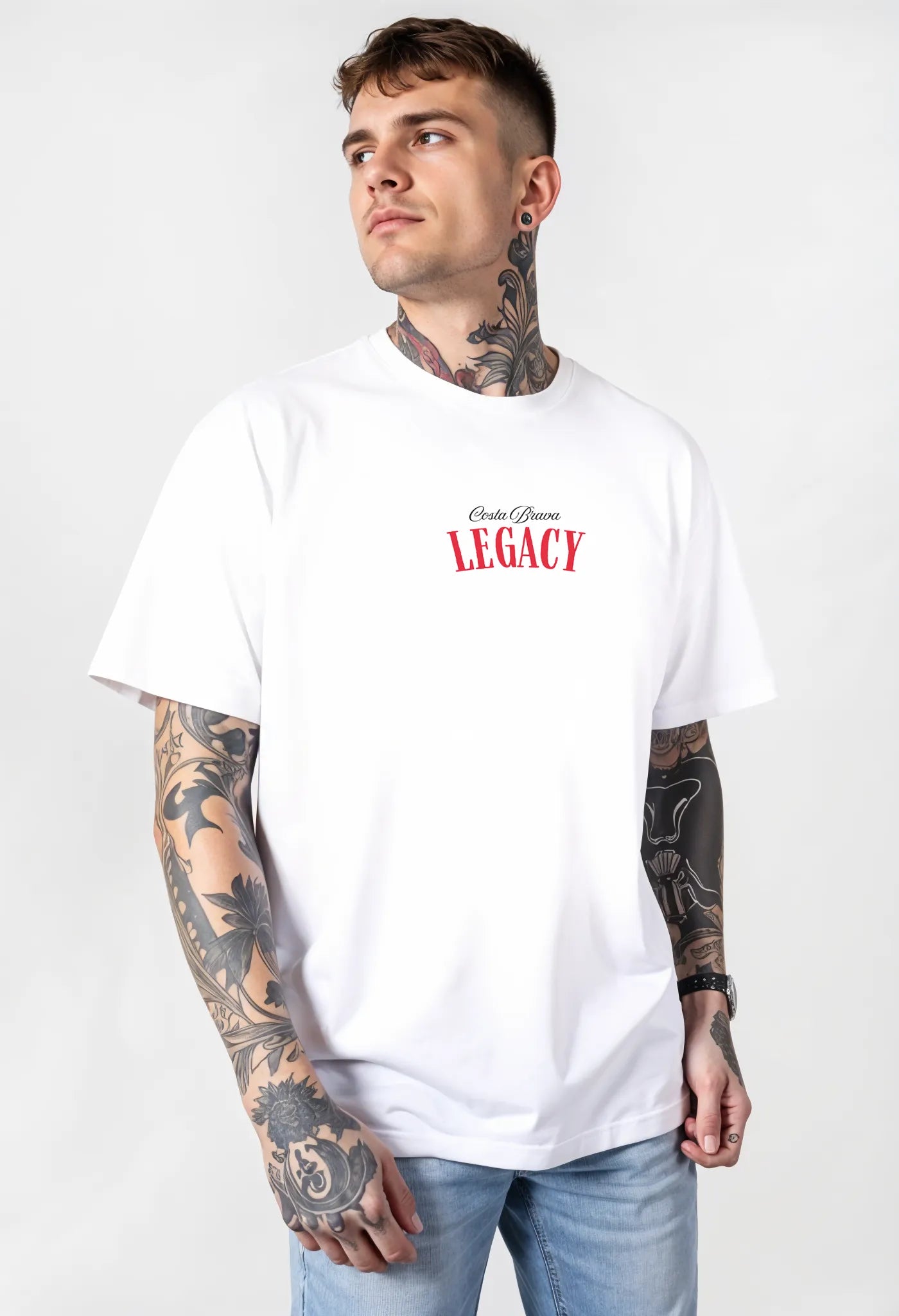 Empulse™ Amalfi t-shirt made from Sorona cotton blend in white, worn by male model with tattoo sleeve