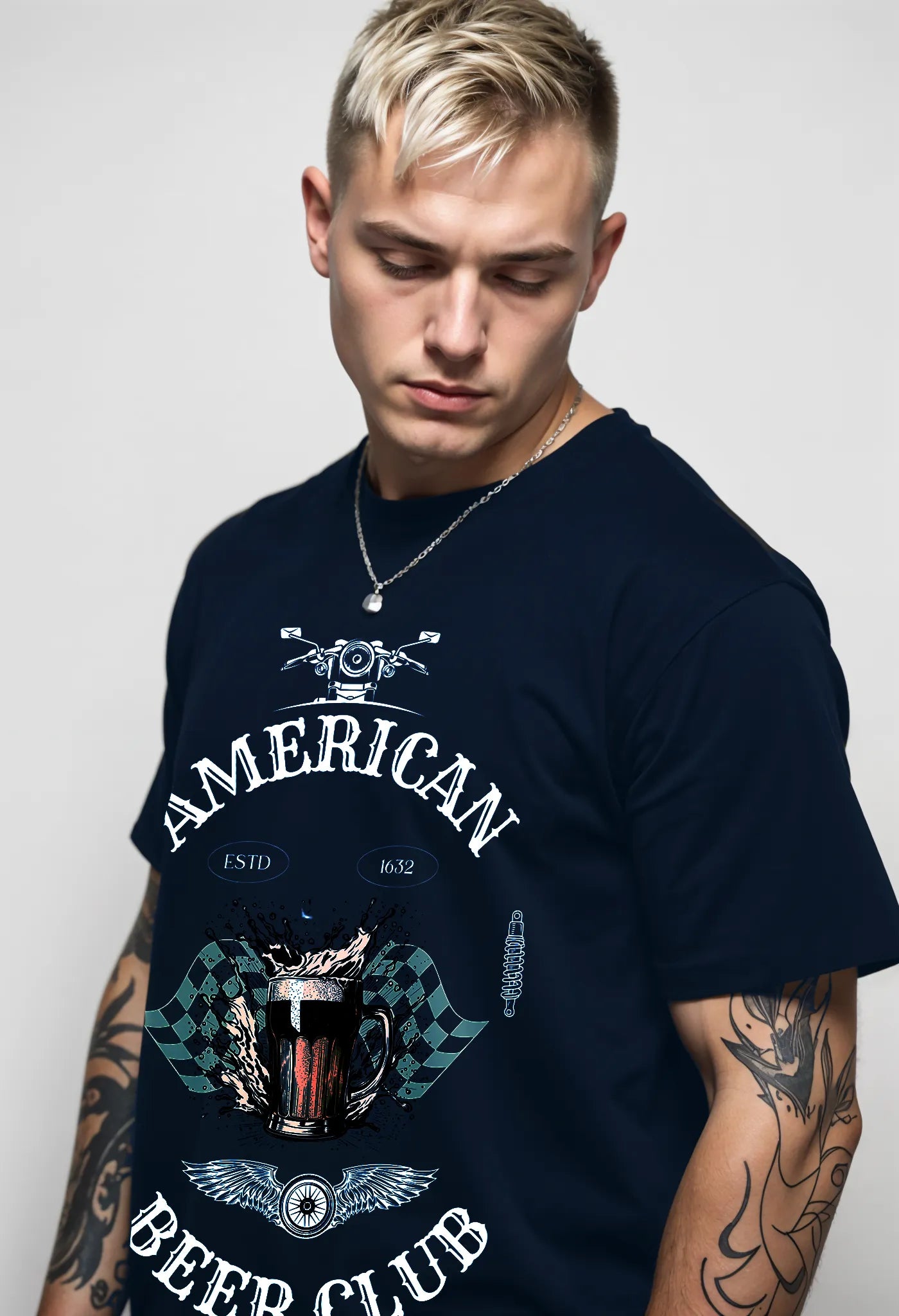 Empulse™ Sorona navy diner tee styled side-on by male model, showing graphic across chest