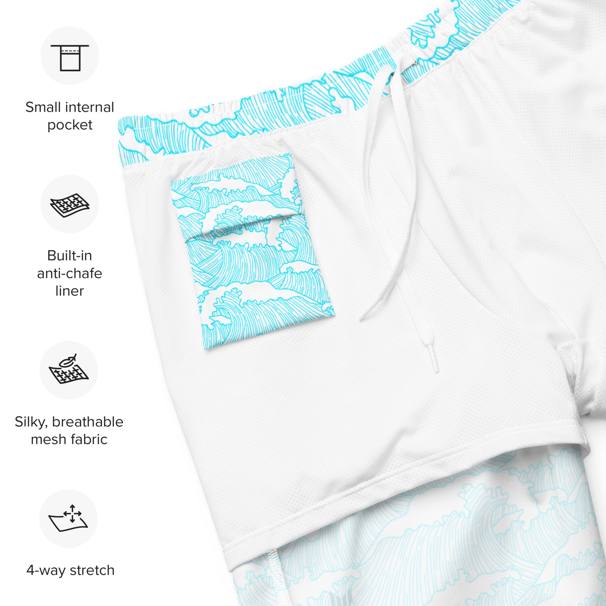 Flat lay of Empulse™ Aqua Tides swim shorts showing interior size label and stitching