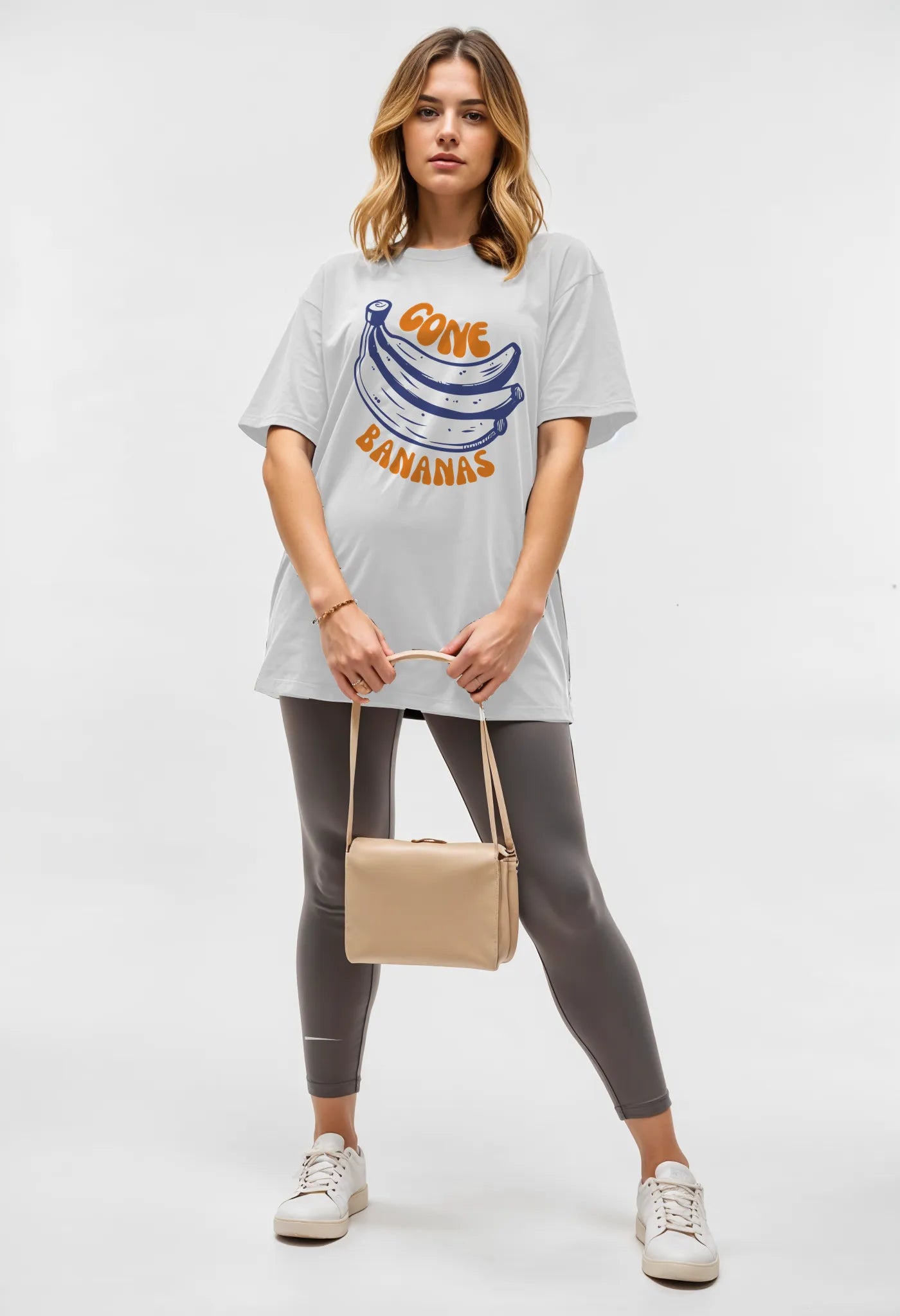 Empulse™ Banana Sorona t-shirt paired with black leggings and sunglasses in full-body lifestyle shot