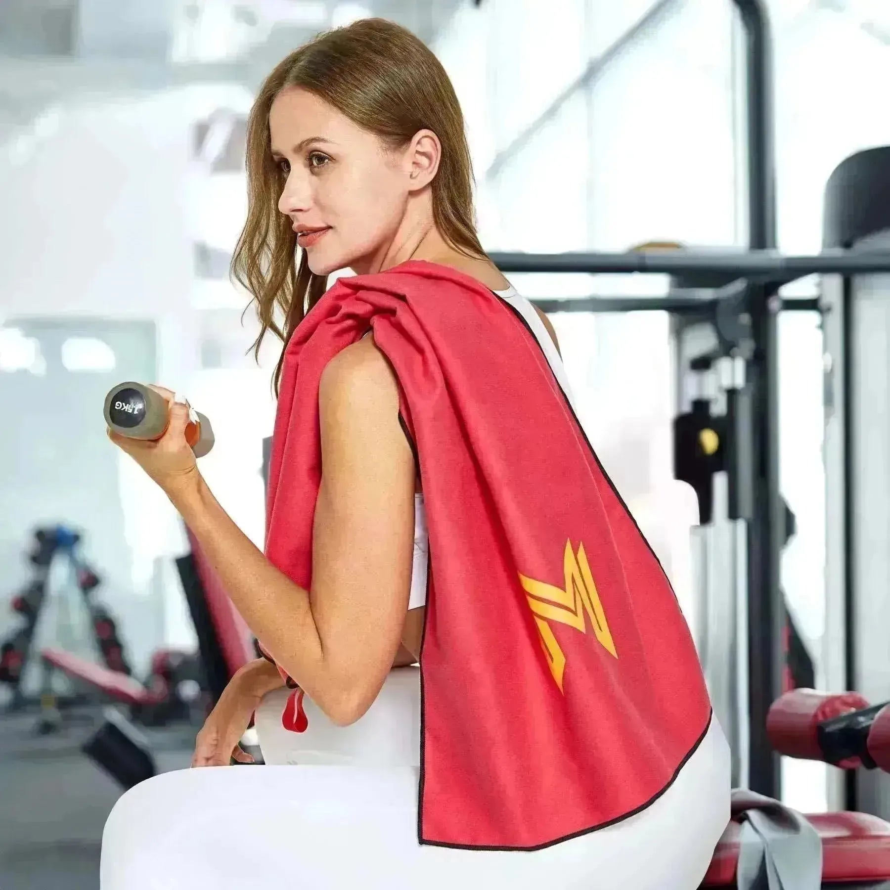 Empulse™ Crimson Core towel worn while lifting weights in gym after workout