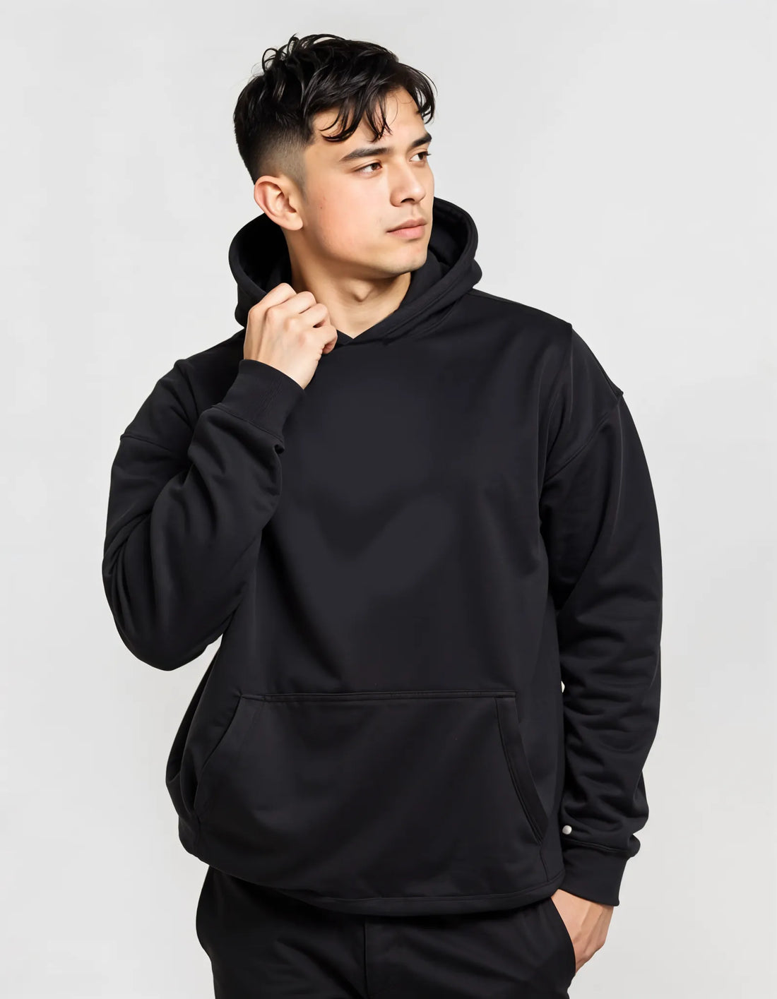 Empulse DNA Oversized Hoodie in black worn by male model front view