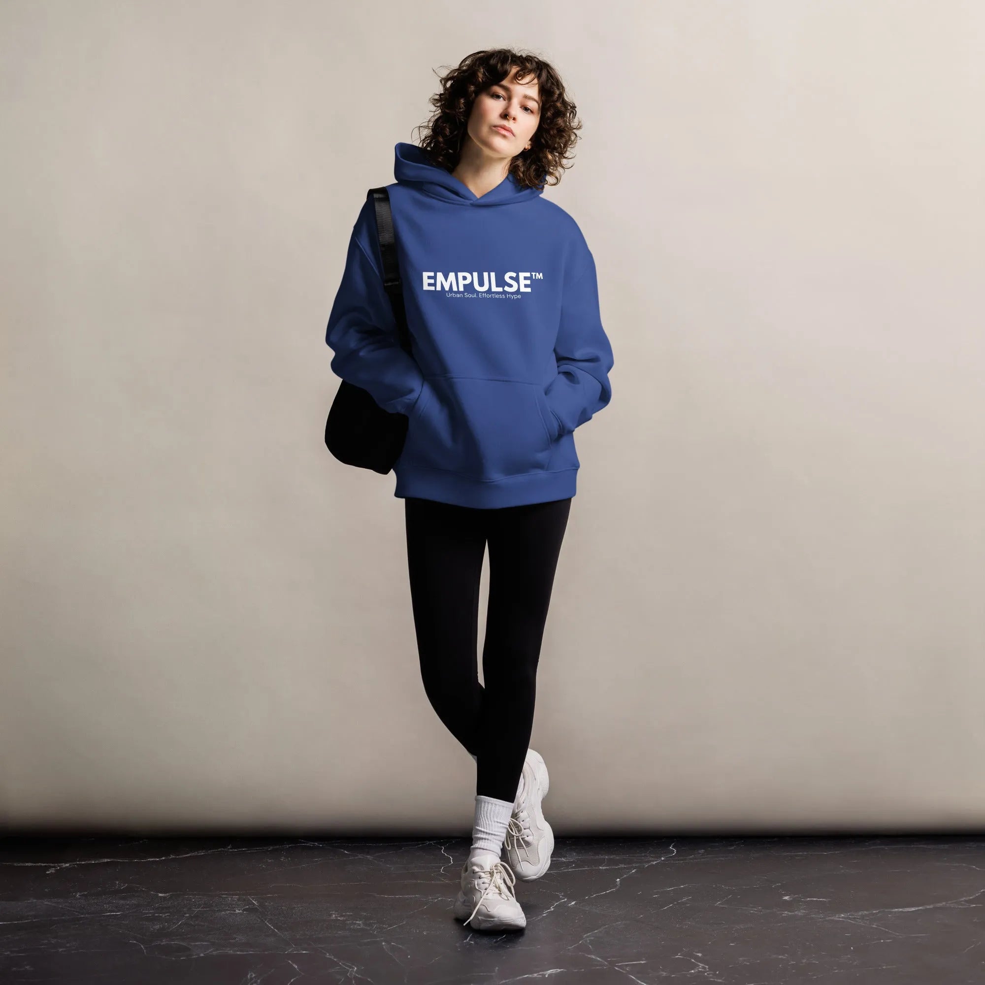 Empulse DNA Hoodie in Blue styled in urban lifestyle setting