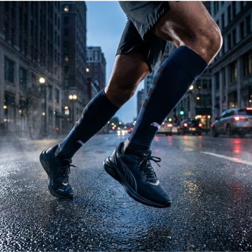 Athlete wearing Empulse El Toro navy knee-high compression socks