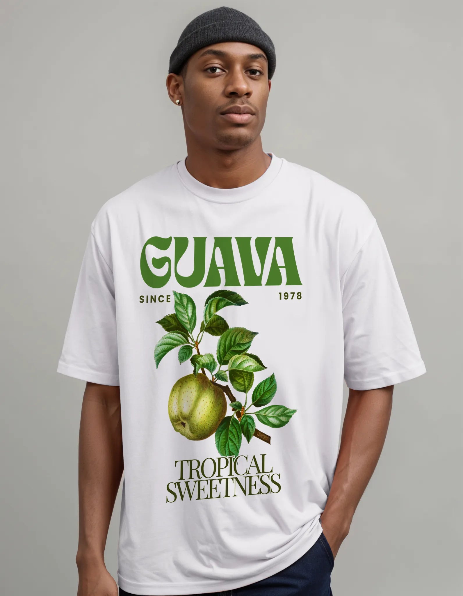 Empulse™ white Guava Juice t-shirt with large green fruit print styled casually in front-facing pose