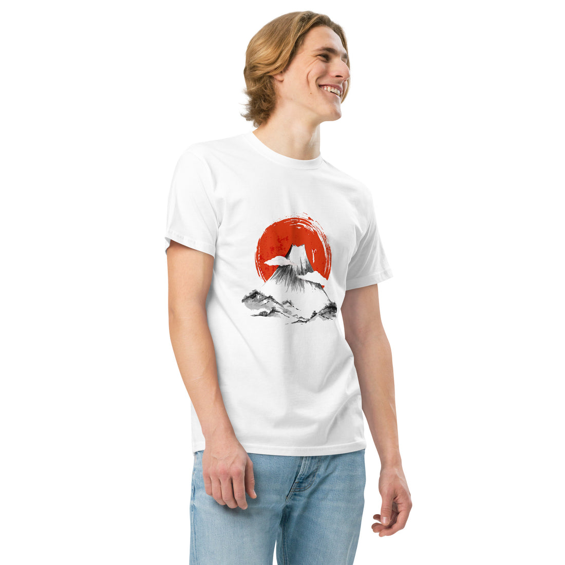 Male model smiling in Empulse® Mt Fuji Rising Sun Tee featuring red sun and mountain design