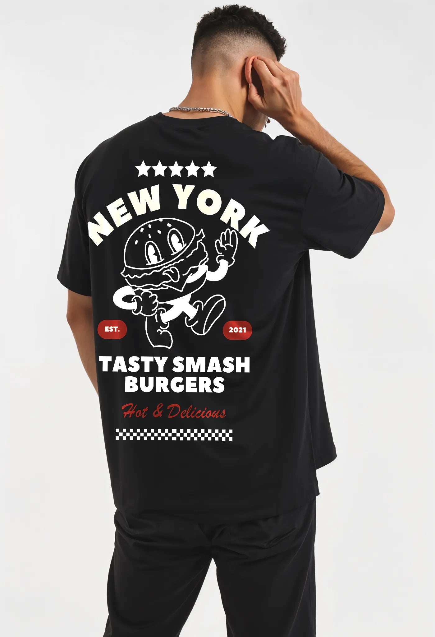 Empulse™ NYC Burger Sorona t-shirt in black featuring diner back print worn by model posing